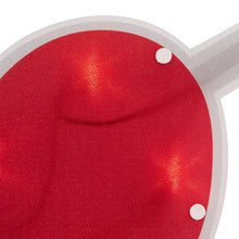 Close view of red heart window silhouette with white edge trim and glowing LED dots