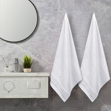 Waffle bath towel set, 2 white towels with textured weave and hemmed edges