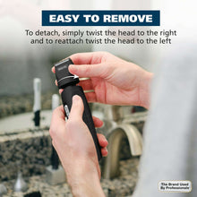 Hands twisting off and on detachable trimmer head, black rechargeable device