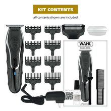 Trimmer kit contents: main handle, foil shaver, combs, and charging accessories