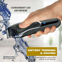 Black cordless wet/dry trimmer held in hand with water splash detail