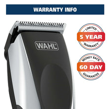 Black and silver beard trimmer with blade guard