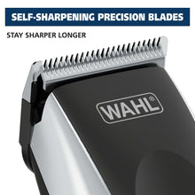 Black and silver beard trimmer with exposed precision blade head
