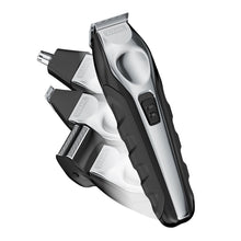 Black and silver beard trimmer with charging switch on body