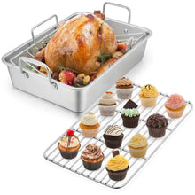 Stainless roasting pan with V-shaped rack and side handles, holding roasted turkey