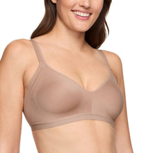 Nude wireless lightly lined seamless bra with V-neck and adjustable straps