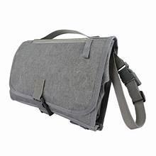 Foldable changing pad with carry handle and side straps, dark gray/black