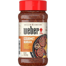 Weber gourmet burger seasoning bottle with red cap and dark spice front label