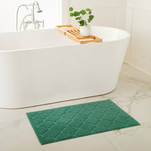 Green geometric bath mat for tub with textured pattern