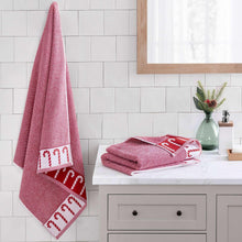 WelHome holiday bath towels, two-pack: mauve with candy-cane border