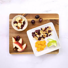 Cheese, fruit & nut snack assortment with cheddar cubes, nuts, and dried fruit