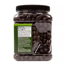 Jar of dark chocolate covered almonds with nutrition facts label on back