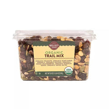 Organic trail mix tub with green label, clear lid, and mixed nuts & dried fruit