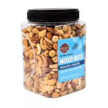 Clear jar of roasted unsalted mixed nuts, assorted cashews, almonds, and peanuts
