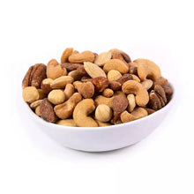 Bowl of roasted unsalted mixed nuts with cashews, almonds, and pecans