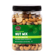 Salted roasted nut mix in clear plastic jar with black lid