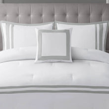 Comforter set pillows and top sheet with gray stripe accents