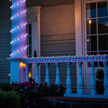 Multicolor color-changing LED rope light strand along a railing edge