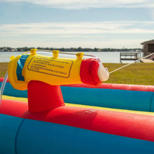 Inflatable slip 'n slide blower nozzle with red and yellow housing and white tube