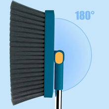 Broom brush head with dark bristles, blue side panel and yellow grip, metal pole