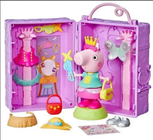 Purple dress-up wardrobe playset with small doll and accessory pieces, open case