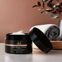 Black neck firming complex cream jar with open lid