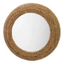 Round wall mirror with woven seagrass frame and clear circular reflective glass