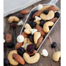 Trail mix scoop with cashews, almonds, dried berries, and yogurt chips