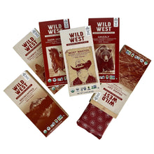 Assorted Wild West chocolate bars and bags with red, tan, and blue wrappers