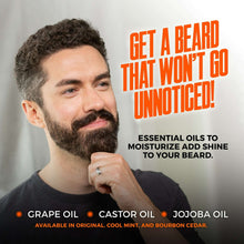Man holding a beard oil bottle while touching his beard