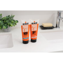 Beard soft conditioner tube standing next to another Wild Willies bottle