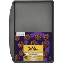 Rectangular non-stick steel baking tray, dark gray, with raised rim and corners.