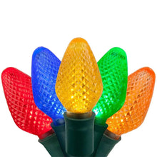 Multicolor C7 LED Christmas lights with green wire, teardrop bulbs on a base