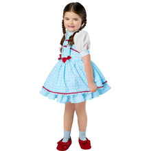 Kids blue Dorothy dress costume shown from the side, with apron panel and red trim