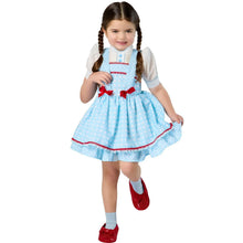 Kids blue Dorothy dress costume with apron, puff sleeves, red trim, and bow details