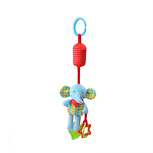 Elephant plush hanging rattle with red cylinder and blue loop ring