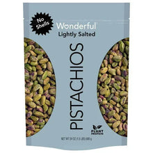 Lightly salted pistachios pouch with green kernels visible through side openings