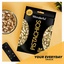Wonderful pistachios pouch next to bowl of in-shell kernels, ready-to-snack design