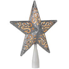 Wooden star Christmas tree topper with gray glitter and orange scrollwork on white stem