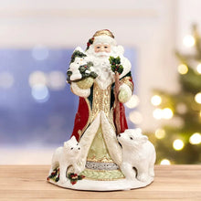 Holiday musical Santa figurine in red coat with white beard, holding tree, with 3 rabbits