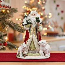 Holiday musical Santa figurine on red base, red coat and white beard, holding tree with 3 rabbits