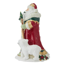 Holiday musical Santa figurine side view, red robe and green cape, with white rabbit at feet