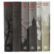 Horror book collection spines showing six bound volumes with title text