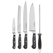 Chef knife set with five stainless blades and black handle grips
