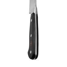 Wüsthof Classic chef's knife handle side view, black with silver bolster