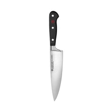 Wüsthof Classic 6-inch chef's knife with black handle and pointed blade