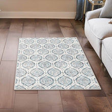 Washable indoor area rug, 3' x 5', light-blue geometric medallion design