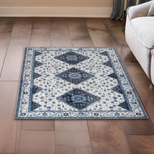 Washable indoor area rug, 3x5 ft, ivory with blue medallion and geometric border