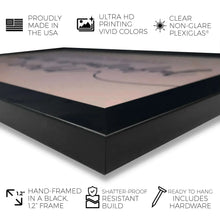 Black framed wall art print with white mat and black border, corner view.
