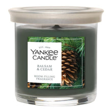 Yankee Candle Balsam & Cedar dark green tumbler candle in a clear glass jar